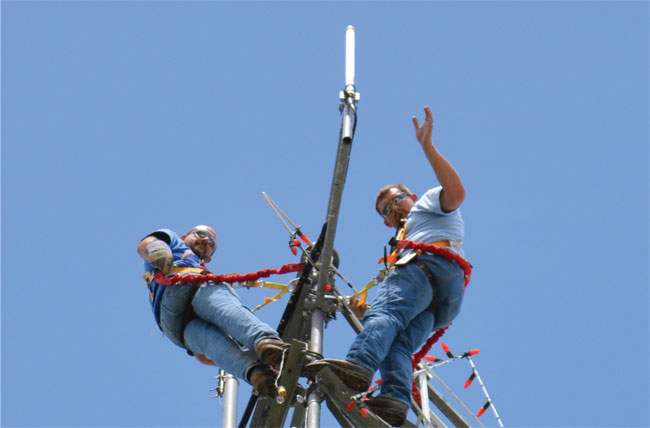 Linemen On Power Pole