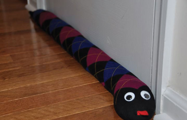 Stuffed Animal Under Doorway Insluator