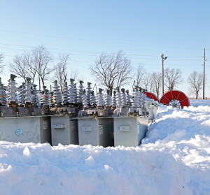 Transformers covered in snow